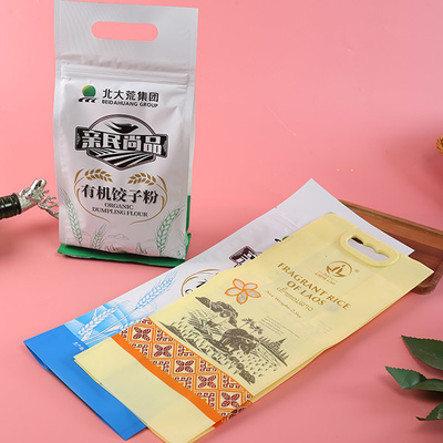 5kg 10kgの習慣は包装袋を防水する弁が付いている米の包装袋を印刷した