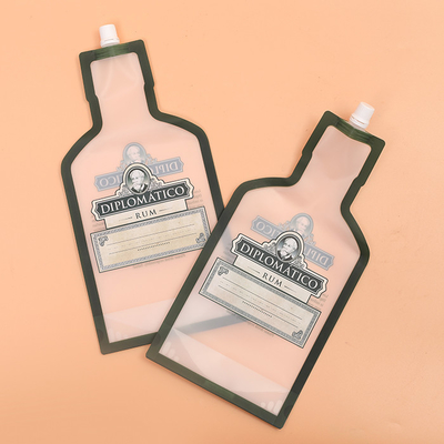 OPPは立場の飲料のための液体の口の袋60micの印刷を薄板にした